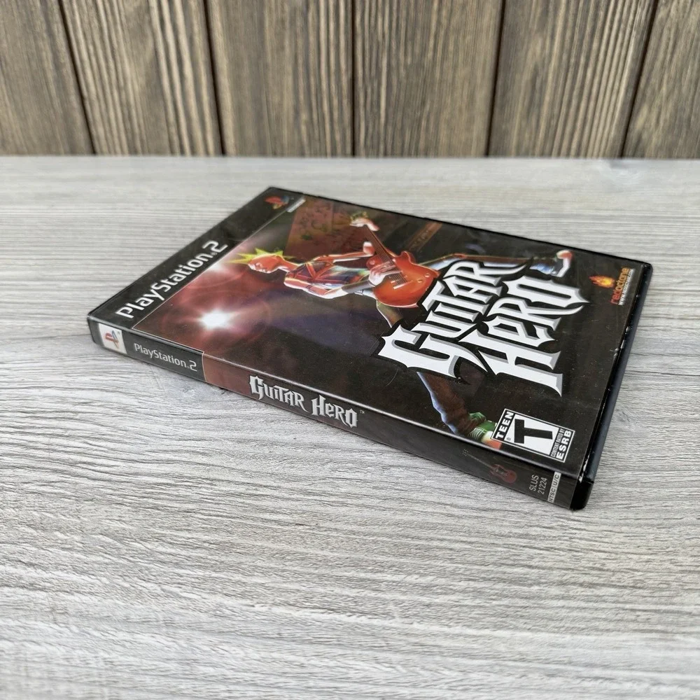 Guitar Hero (Sony PlayStation 2, 2006) Complete With Manual